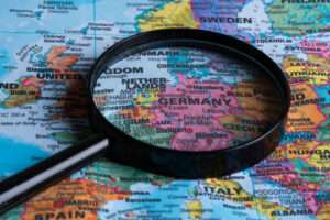 DAS ZEITUNG 11 map germany through magnifying glasscloseup